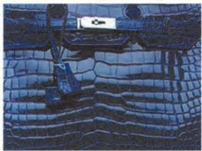 Replica Handbag Store Leather Types-Lisse (glossy) crocodile in ultraviolet—hand-polished to a glassy sheen, scales look like lacquered tiles.