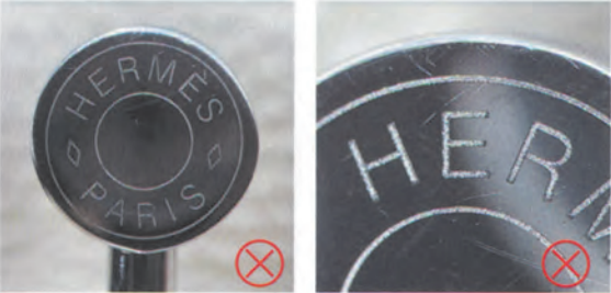 Replica Handbag Store Kelly Bag Replica-Counterfeit metal engraving on fake Hermès Kelly bag hardware, with shallow and uneven "Hermès Paris" lettering.