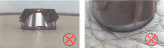 Replica Handbag Store Kelly Bag Replica-Counterfeit bottom studs on fake Hermès Kelly bag, featuring flat caps and loose attachment with red X marks.