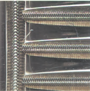 Hermès lock part with minimalistic design – focus on metal contour and finish.