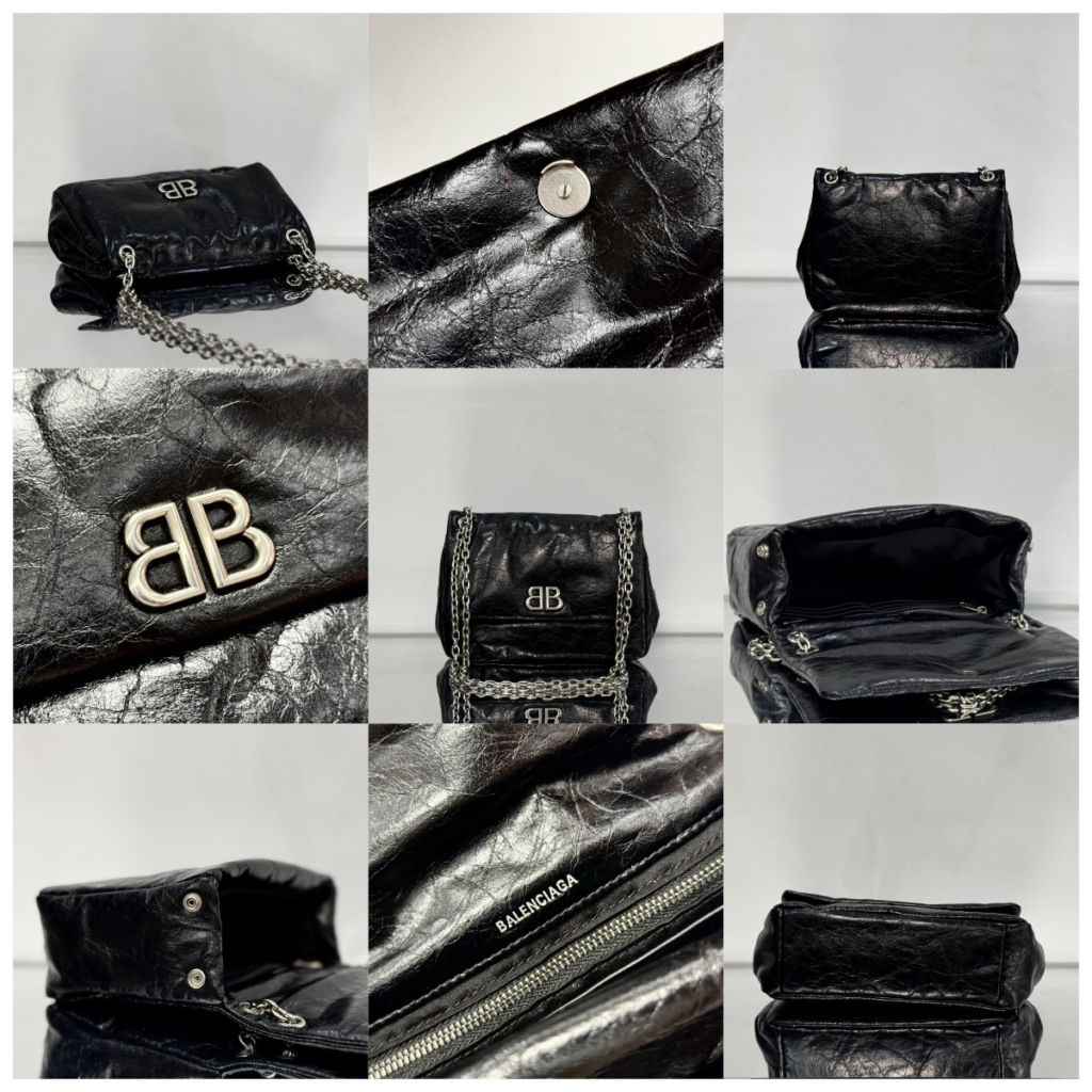 Close-up of Balenciaga Monaco replica bag featuring crushed black leather texture, puffy quilted finish, and aged silver BB logo hardware for 2026 trends.